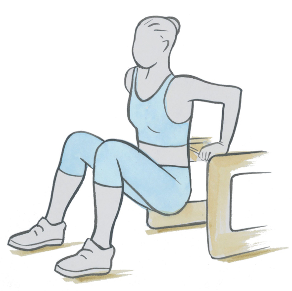 El ejercicio de la silla para los bíceps. 
